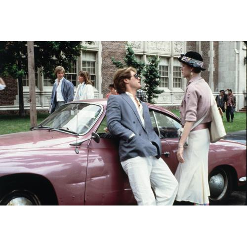 Molly Ringwald and James Spader - Pretty in Pink film still Stef leaning against Andy's Car in front of High School