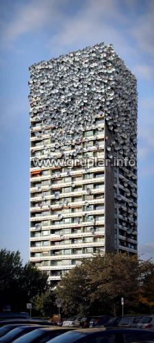 Building in Bangladesh - It is a funny building in Bangladesh it is full of dishes I wonder the people in the upper floor how to see the sun? lol.