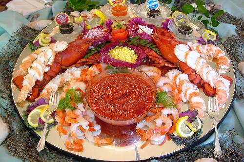 seafood delight - very delicious seafood in a catering. lobster and shrimps all over.