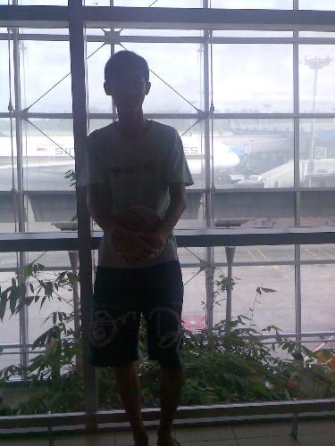 Basketball at the airport - A person who love basketball, as you can see. But doesn't play that well in fact.