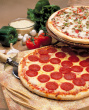 two pizzas - photo of two delicious pizzas