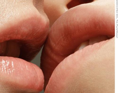 kiss - two people kissing each other