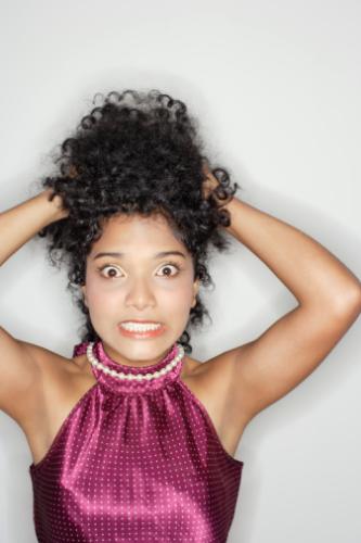 woman who is stressed out - photo of woman with hands on head frustrated and stressed out