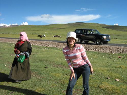 Me in Tibet - This is a photo taken last year when I was in Tibet. I went there to visit my friends and take a trip around the city. It's a real thrilling experience to me, the sky, the air and the whole breath-taking beauty! It is one of my favorite pictures ever taken. I believe there's a story to every photo and this one surely has one and more.