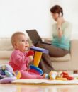 stay at home mom - stay at home mom working while child plays