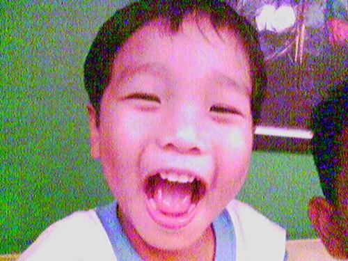 what a smile! - this is my brother chicken.. I really love the way he smiles. I'd love to be a kid again, every time I will see him smiling.