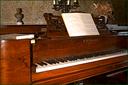 wooden piano - an old wooden piano
