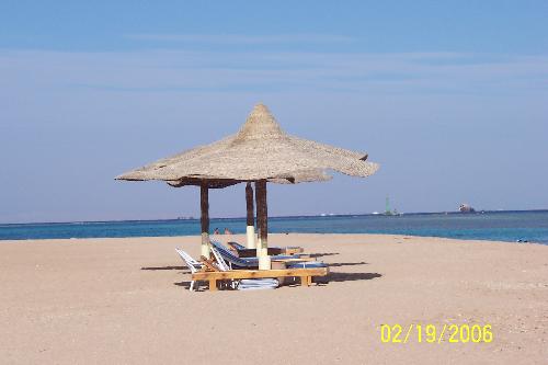 Tranquil Beach - Photo was taken on one of my visits to The Conrad Hotel, Sharm el Sheikh, Egypt - it was a wonderful tranquil beach. The sun shined all day, it never rained and the sea was warm and full of different types and colours of fish. Brilliant place to go for a holiday especially if you like diving or snorkelling.