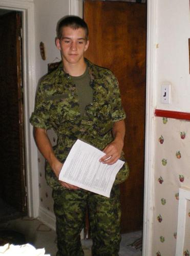 My son in his Army uniform for the first time - My 16 yr. old son picked up his army uniform and gear yesterday. I don't know about you but I think this a great pic and he looks so handsome. He is very much against us taking his picture but I snuck up on him for this one. Unfortunately, he is really angry about this. He has been very mean and rebellious to me and even to his girlfriend with whom he is in love very much, not just about the pic but about everything recently. I don't know what's going on in his head, but he is hurting all of us, his family and friends with his sarcasm and rebellion.