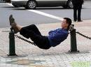 sleepless - man lying on the chain