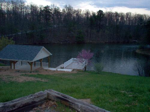 Our pavilion on the lake - This picture was taken the day we moved into this home. We have 3 acres, 2 of which are not wooded and need a lot of work! I love my 'back yard'. LOL
