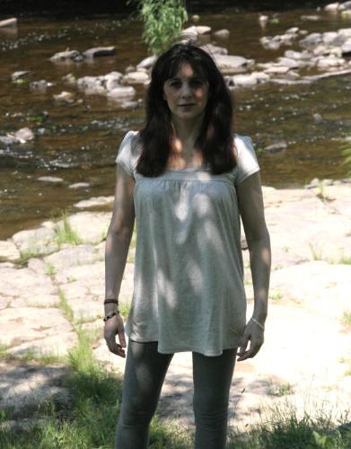 No, I am NOT pregnant! - I'm wearing a babydoll top. Camping in June 2008. My husband says I look 8 months pregnany here. Hmpf!