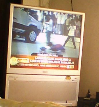 watching TV - Watching my favorite television shows in this 41' projection TV is so relaxing.