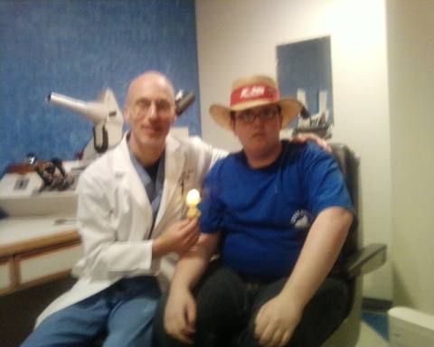 My son Stuart with his eye doctor - My son also was born with cataracts which made things harder for him until he had surgery when he was five years old. This picture was made Tuesday when I took him for his yearly eye exam.