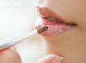 woman - Woman Applying Lip Gloss