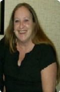 Me at my Aunts funeral - Here I was saying goodbye to my Aunt of 97 years and all of a sudden a woman walked up to me. It was my long lost friend that I knew since I was so tiny. I had missed her all these years and tried so hard to find her. My Aunt raised me but wouldn't allow me to play with other kids. I always cried because I wanted to be with my best friend but for reasons that are too detailed, she would not allow me to communicate with others. I finally went into a foster home and then married. It took me 39 years before I could see my friend again. The feeling I had when she walked up to me was inscribable. This time she had searched for me out of all the people at the funeral. She asked for me and someone told her where I was sitting. I was so estactic about seeing her and then I didn't feel so sad anymore. After thinking about it, I felt that my Aunt must have been looking down from Heaven and led her to me. Knowing she denied me that friendship for so many years that maybe now she was saying she was sorry and it was okay to be friends. I felt like it was a sign and a gift from her. My friend only happened to read about her death in the newspaper and decided at the spur of the moment to come say good bye to her. I had to take a picture of us together so I could always remember the moment and her face. In this picture I have cut out my friend only because of privacy and I don't think it would be right to post someone's picture without them approving it.