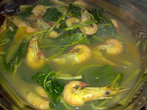 eating - shrimp sinigang is so delicious to eat