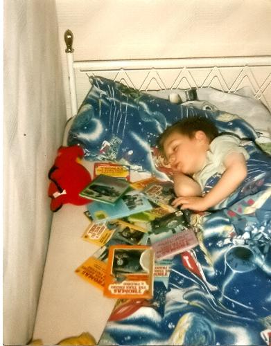 My boy, many moons ago - Deep sleep here surrounded by all his Thomas books. I think all the reading wore him out :)