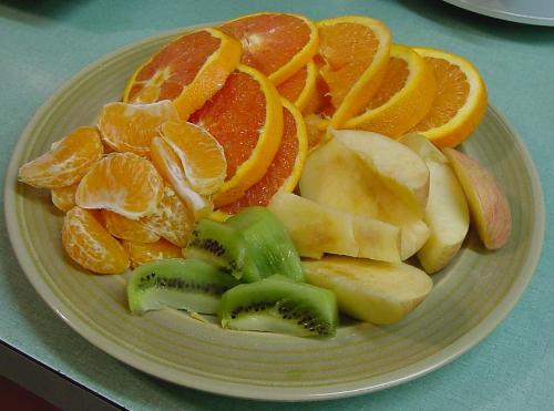 Glorious Food - A picture of fruits.  This picture has a few different pictures of fruit. It looks delicious just the way it is arranged.
