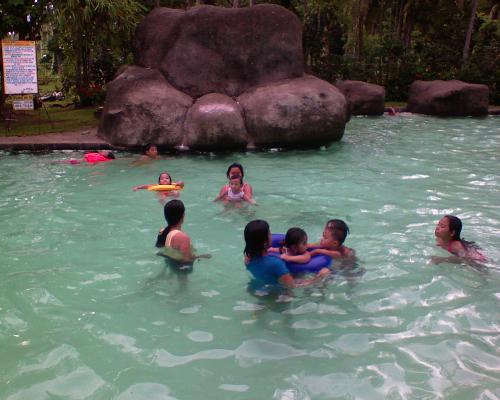 swimming - people who enjoy swimming at the pool