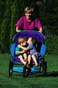 Children - Mother Pushing Kissing Children
