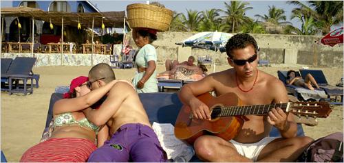 goa beach - Foreigners having a kiss at goa beach