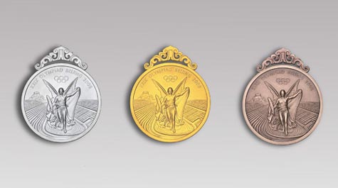 Medals for 2008 Olympic Games - The medal for the Beijing 2008 Olympic Games is designed with inspiration coming from 'bi', China's ancient jade piece inscribed with dragon pattern. The medals, made of gold and jade, symbolize nobility and virtue and are embodiment of traditional Chinese values of ethics and honor, sending forth strong Chinese flavor.  The medals are 70mm in diameter and 6mm in thickness. On the front side, the medal adopts standard design prescribed by the International Olympic Committee. While on the back, the medal is inlaid with jade with the Beijing Games emblem engraved in the metal centerpiece. The design inspiration of the medal hook derives from jade 'huang', a ceremonial jade piece with decoration of double dragon pattern and 'Pu', the reed mat pattern.  I get this from China daily