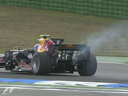 oil spray - a red bull car in serious trouble. the driver retired after 2 laps
