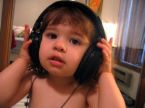 listening music - you see my little cousin shakes and shakes with his music..