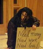 homeless person with sign - need money, need food, need love... true even if you aren&#039;t homeless