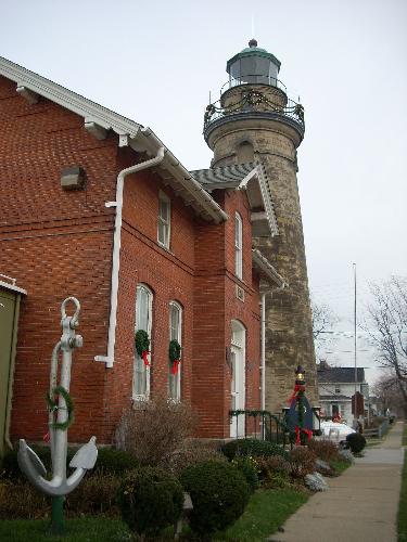 A Gorgeous Lighthouse - This is a picture of Old Fairport Harbor Lighthouse and Museum In Ohio.  When we got there they were about to close up, but since we had traveled so far to see it, the Inn Keeper let us tour the museum. If you get a chance to go there it is really a beautiful spot, and you can look out over the water.