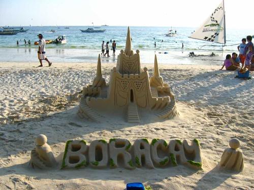 Boracay - The 3 syllable word Boracay is said to have come from the local word borac, meaning cotton, a reference to the sand's color and texture.