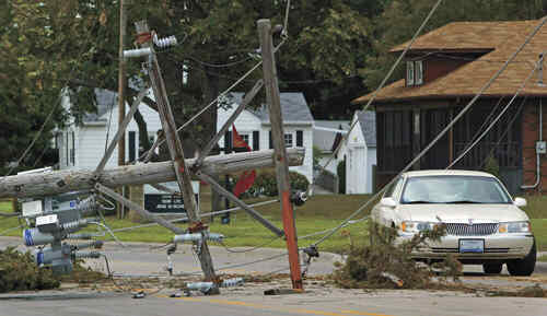 damage from the storm - This is one of many power poles that got snapped off during a severe storm that hit our area on 7/21/08.