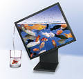 LCD monitor - photo of LCD monitor with fish with water flowing into a glass