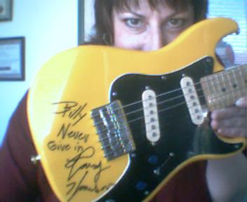Bradley mini electric guitar - I had Randy Hansen sign this for my son.