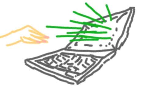 Laptop Money - A green glowing laptop.