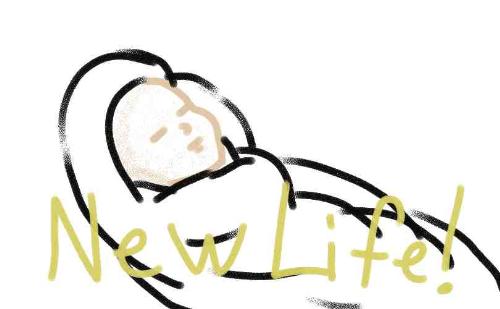 New Life - A newborn baby wrapped in a white blanket.