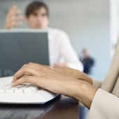 typing on keyboard - photo of Businesspeople in office, close-up of hands on keyboard