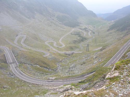 Trans-Fagaras Highway  Romania - This is a very twisty mountain road that passes over one of the highest mountain ranges in Romania.   It is an amazing ride.