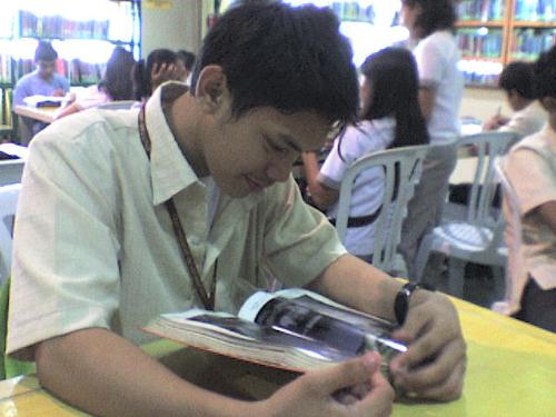 sarge99 - Me in the library of our school ready national geographic books.