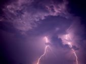 Lightening in the sky - The lightening lit up the sky and it flashed real pretty. God's power at work in the sky.
