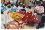 rejoicing - can you see the traditional attire of the family it is always very interesting being a part of the celebration