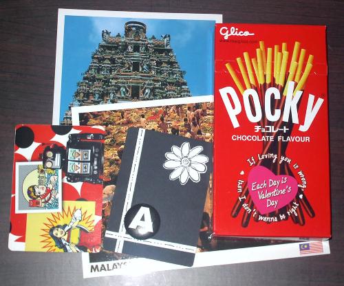 Pocky - These were sent for a swap. Pocky is there, the red box thingy. :)