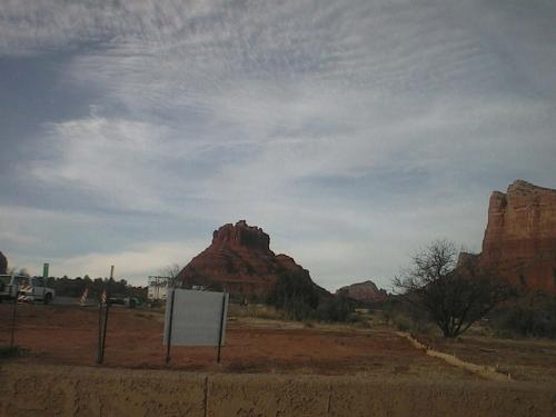 Bell Rock - Off in the distance, but I really don't have time to ind a close up. This is the picure I took on the way into Sedona from the pHoenix airport in Feb of 07