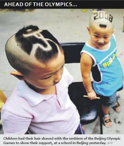 Shaving the Olympics on their head! - To show their support for the up coming games.
The first time the games will be held in China.