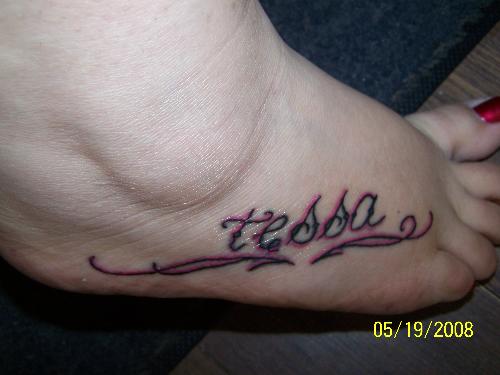 Tattoo - My daughters name on my foot; i also have another one on the opposite foot with my son's name