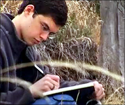 Christopher Paolini - this is just a picture of Paolini writing