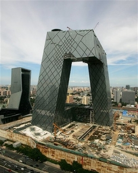 building, headquaters, olympics, beijing - This is the new television headquarters in China getting ready to face the Olympics in China.