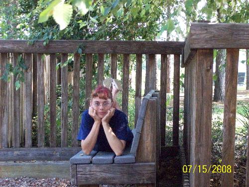 Posing for A picture - It is a picture of me. My Oldest Daughter has gotten to where she like to take pictures. So she has me pose for picturs. It was taken a a local Park. She has me pose any way she wants and i get in the pose and she takes it.