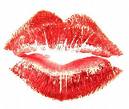 kiss - artistic image of ruby red lips.